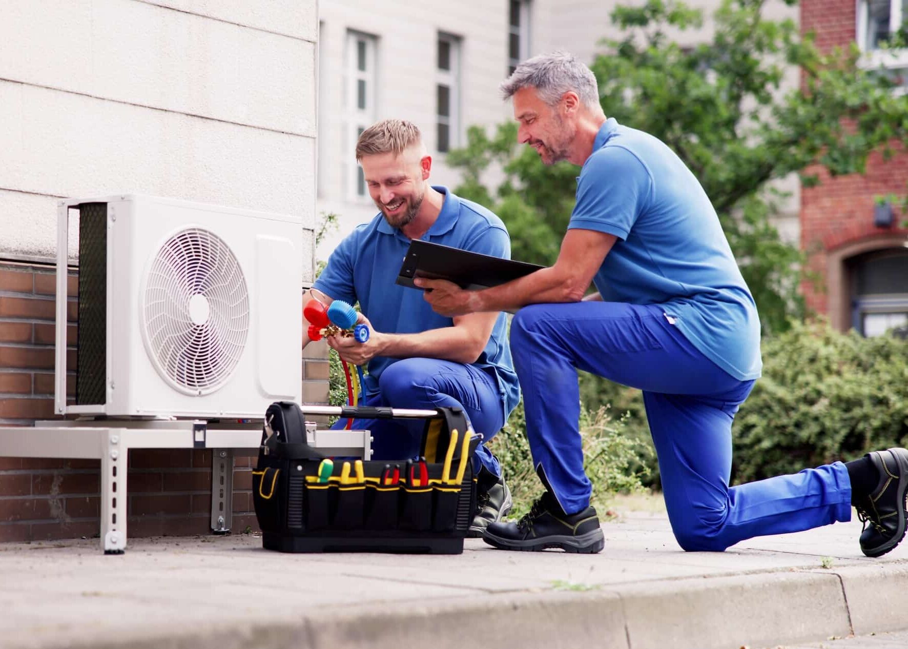 Technicians Testing Heat Pump